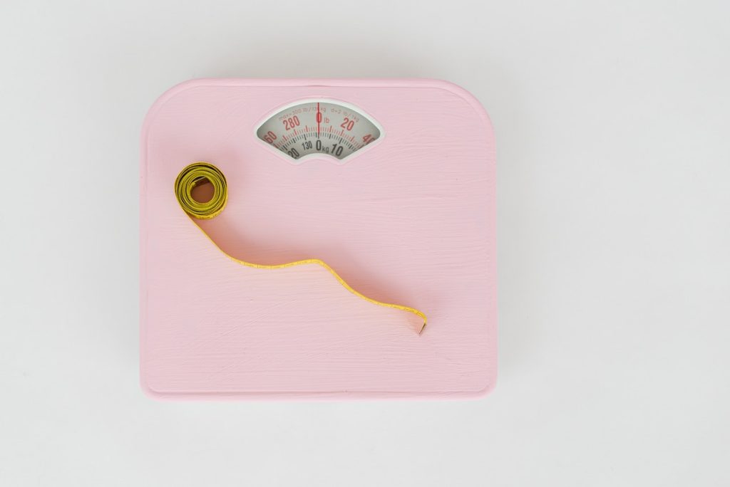 weighing scale and tape measure
